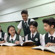 college students in classroom with other students, stem vs humms