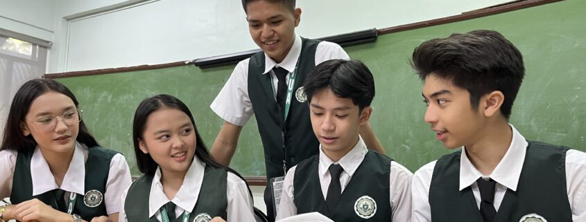 college students in classroom with other students, stem vs humms